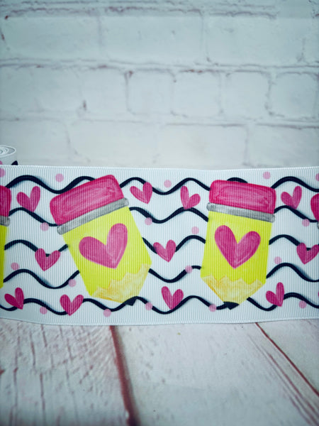 Pencils with pink hearts