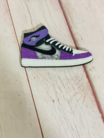 Purple Nike shoe