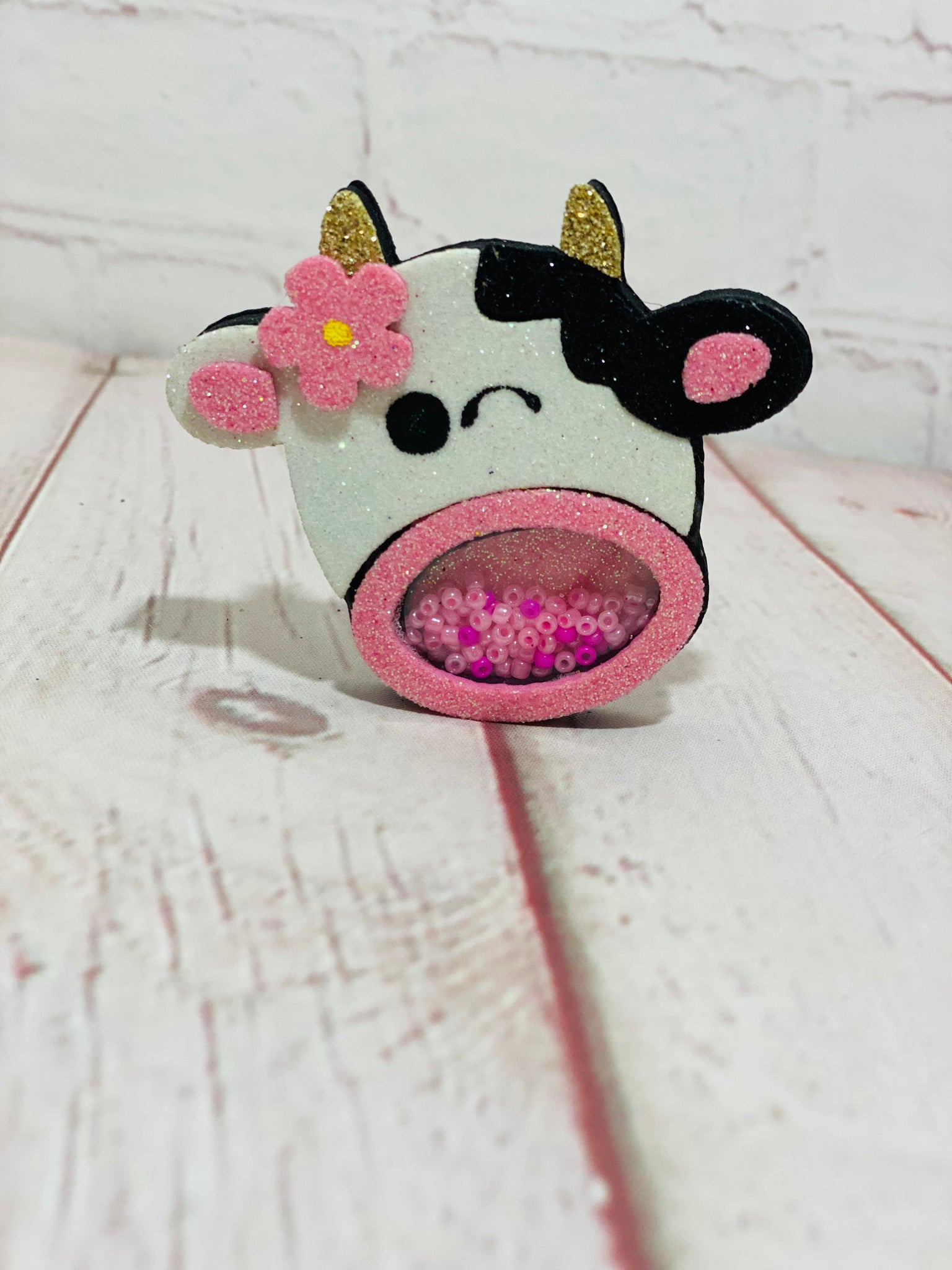 Cow shaker