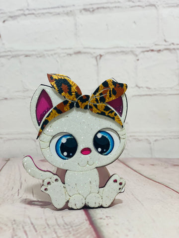 Cat with bow shaker