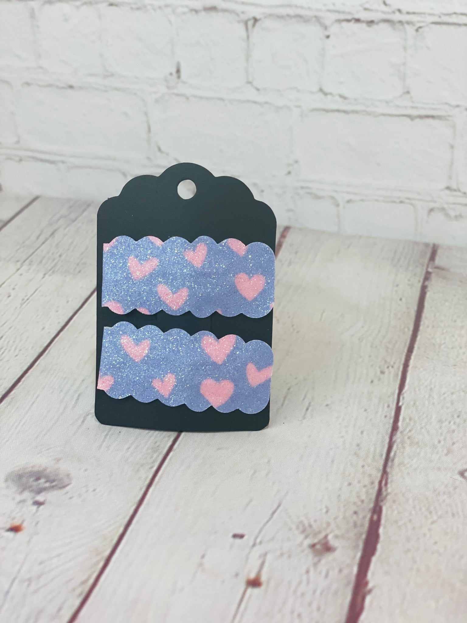 Purple w/ pink heart glitter snap clips